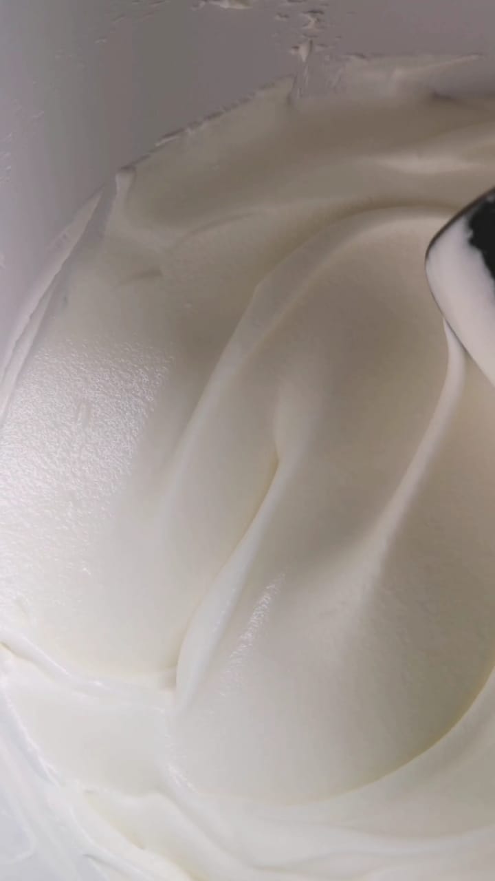 Close-up of Mirath beauty tallow whipped tallow cream — rich, silky texture with natural stripes, showcasing deep nourishment from free fatty acids that feed and restore skin.