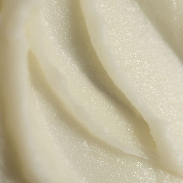 Close-up of grass-fed tallow from Mirath Beauty Lebanon, showing its smooth creamy texture, a traditional skincare ingredient trusted for nourishment and repair.