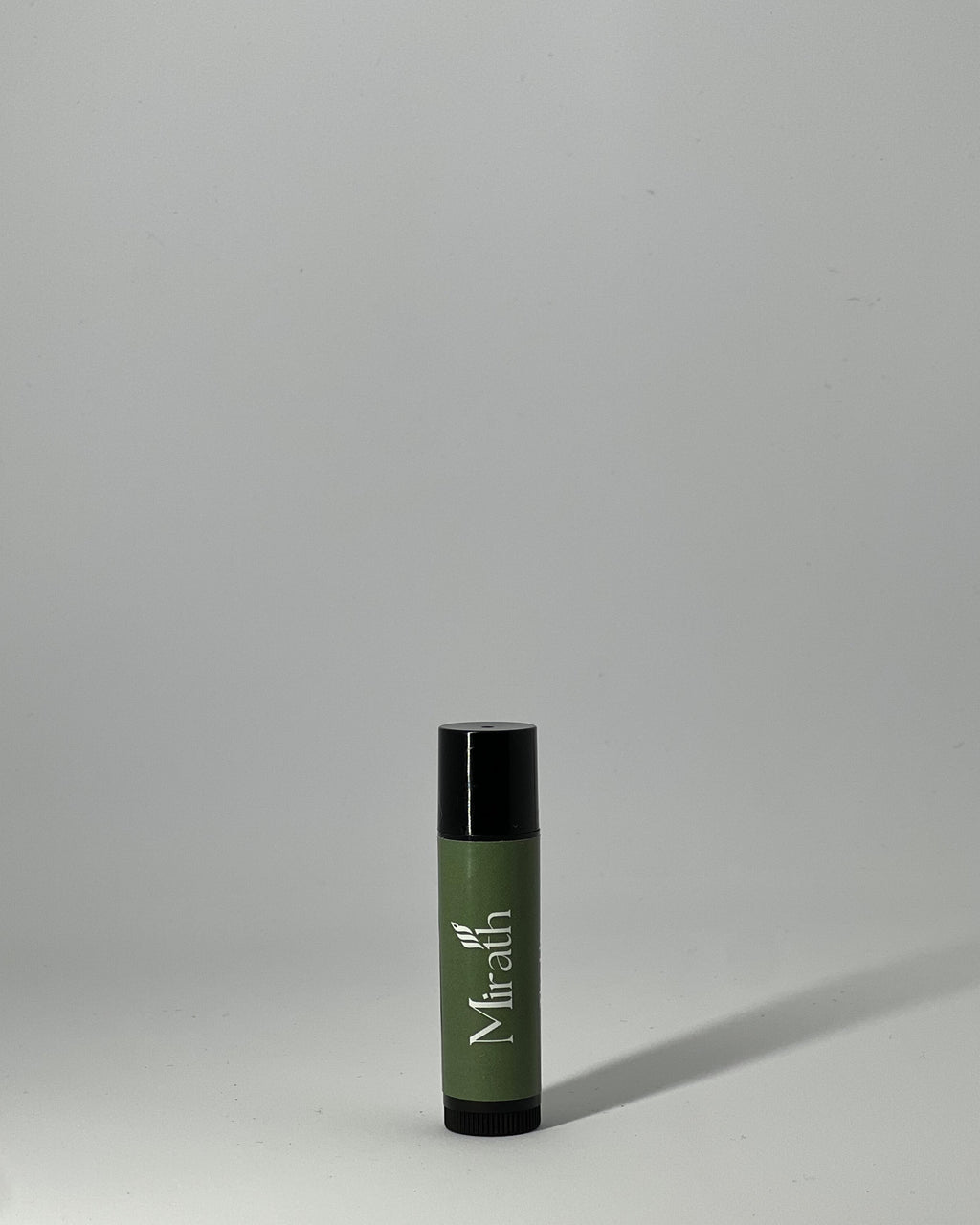 Tallow lip balm for dry lips by Mirath Beauty - The Lip hydrating balm in twist-up tube, front view on clean background