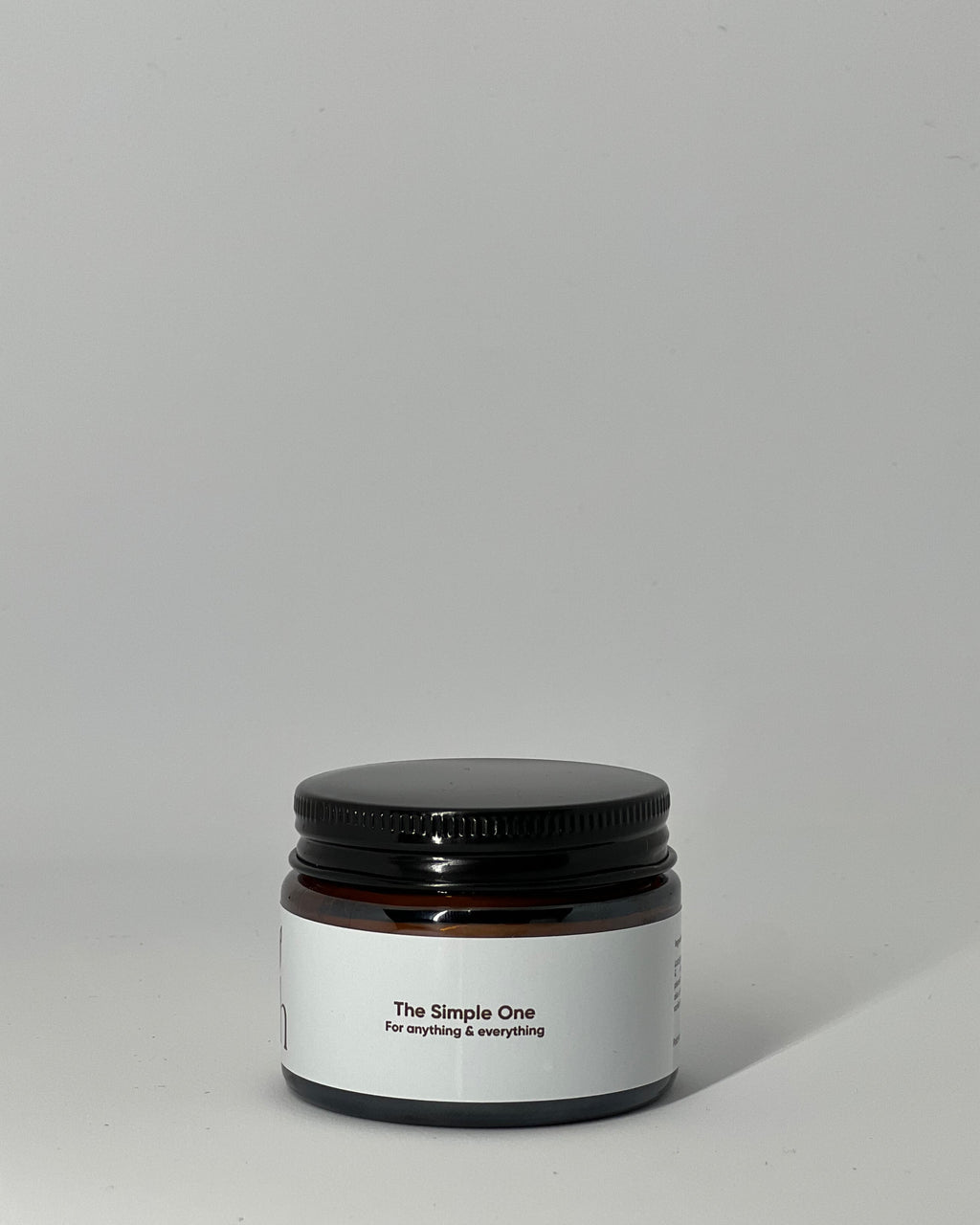 The Simple One tallow cream jar side view showing product name and 'for anything and everything' description - all-purpose skincare for face, body, and hands by Mirath Beauty made in Lebanon