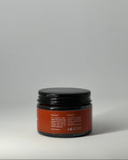 back view of the sun cream tallow mineral sunscreen jar with ingredient list: grassfed tallow, non nano zinc oxide and nourishing butters, with directions, patch test warning, recyclable packaging, made in lebanon